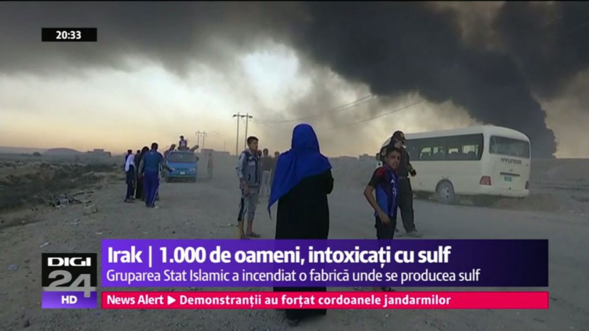 VIDEO. ISIS a incendiat o fabrică de sulf: O mie de oameni intoxicaţi