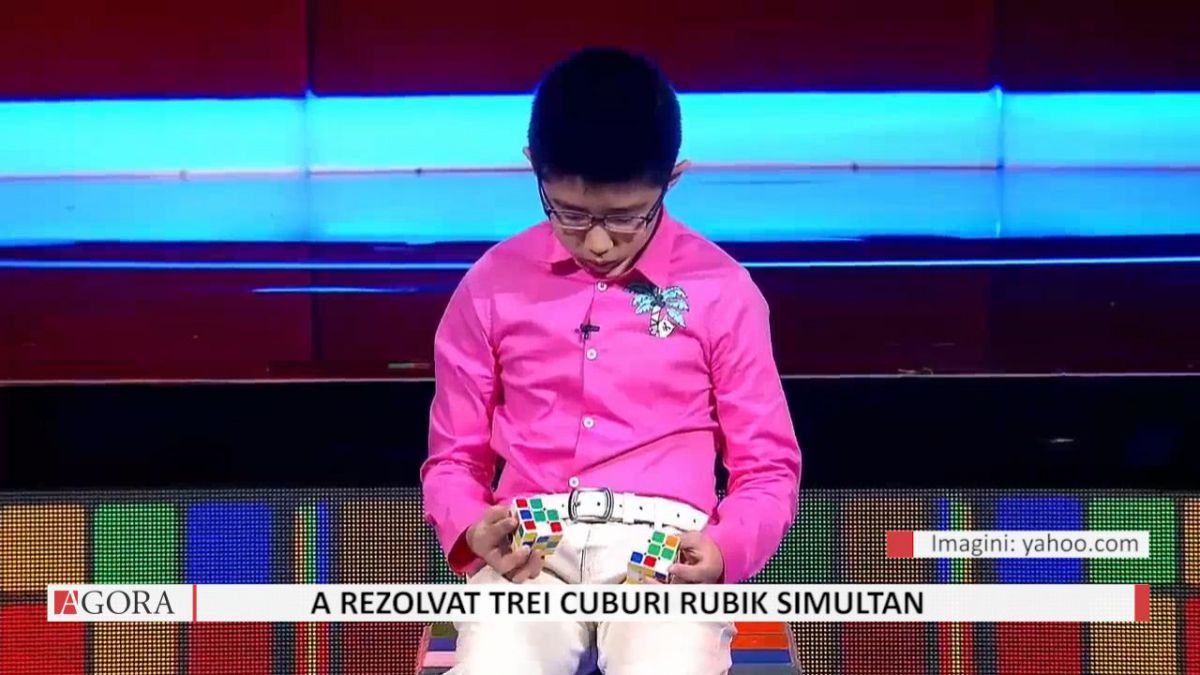 VIDEO. Un copil din China a rezolvat trei cuburi Rubik simultan, inclusiv cu picioarele